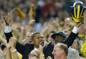 Two of the Fab Five, Jalen Rose and Ray Jackson, supporting their alma mater. 